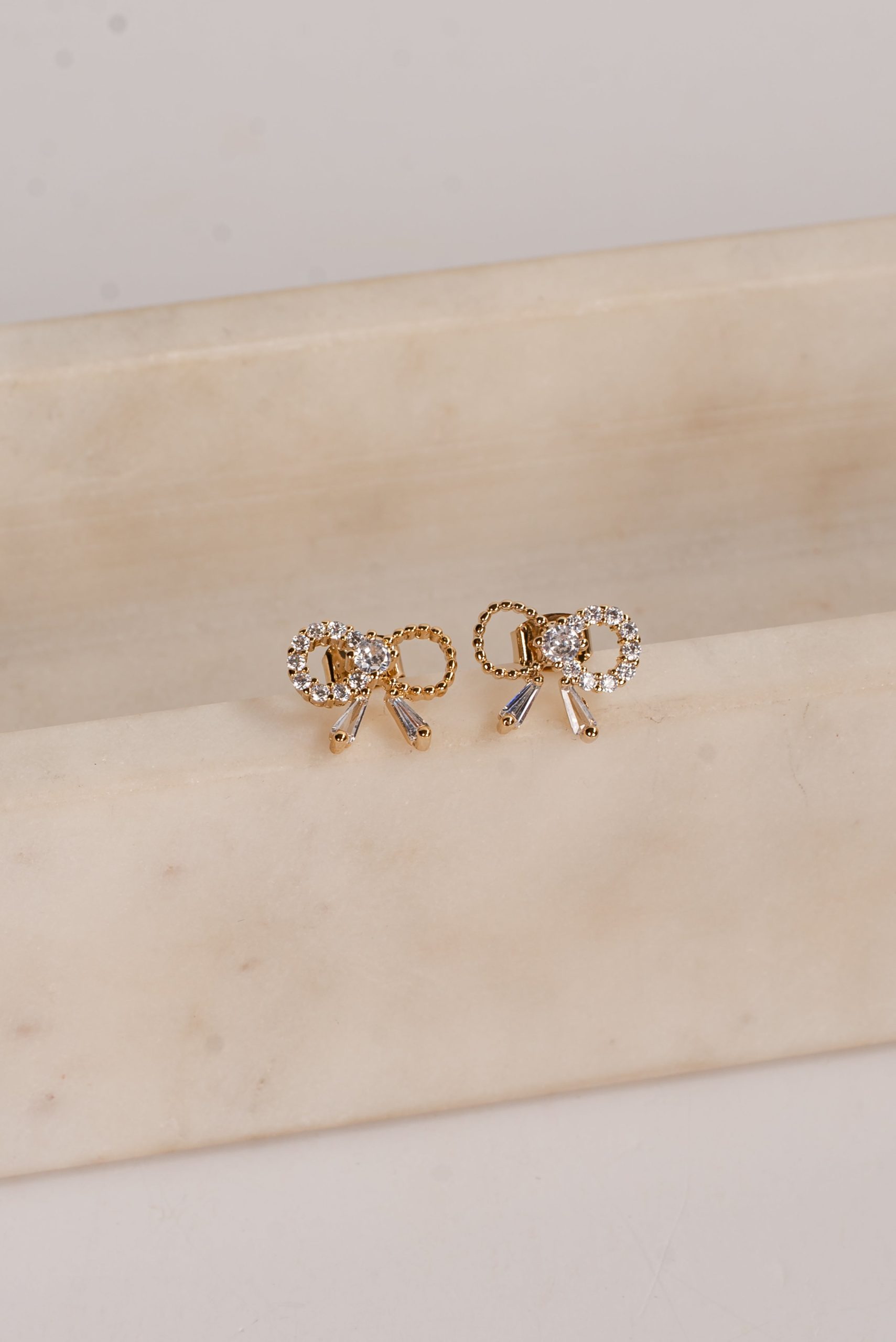Allie Gold Rhinestone Bow Earrings - Image 3